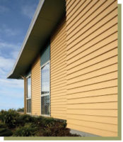 Large House With Yellow Fiber Cement Siding