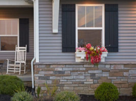 Beautiful house siding that complements the brick border