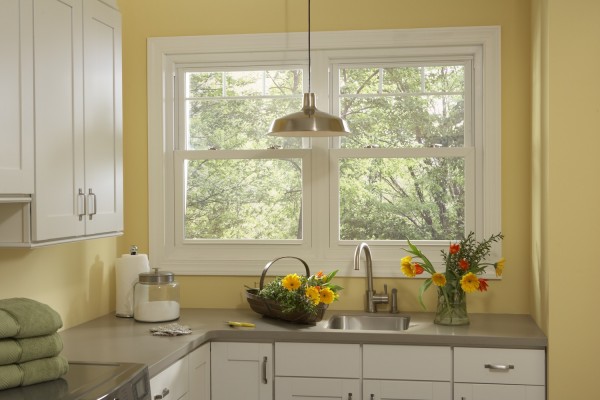 Yellow Kitchen With Single-Hung Windows